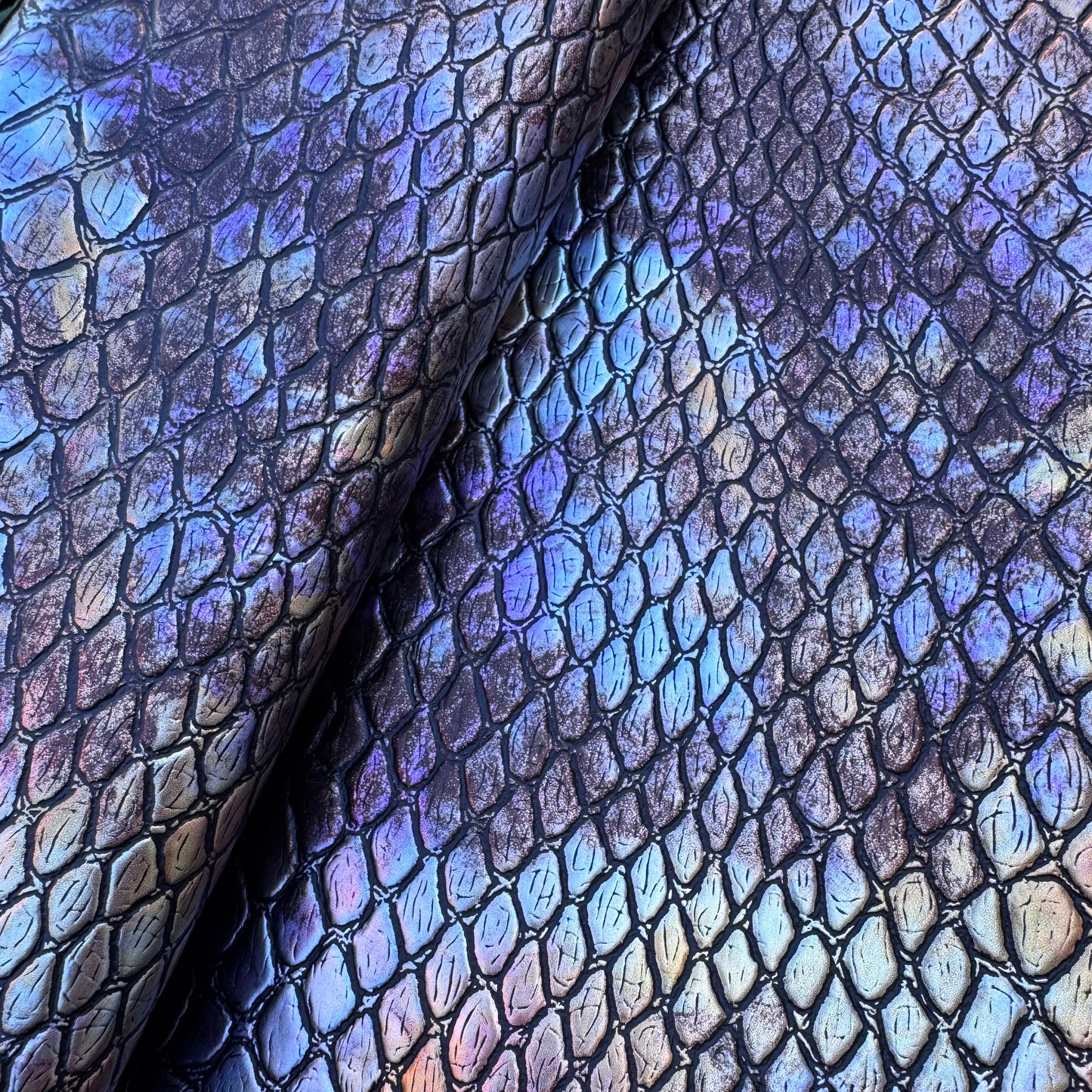 Dragon scale or perhaps Python vinyl/faux leather