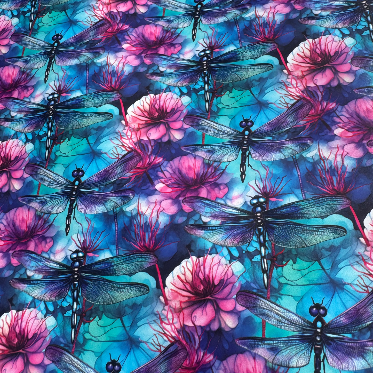 Pattern of dragonflies and pink flowers on a blue and purple background