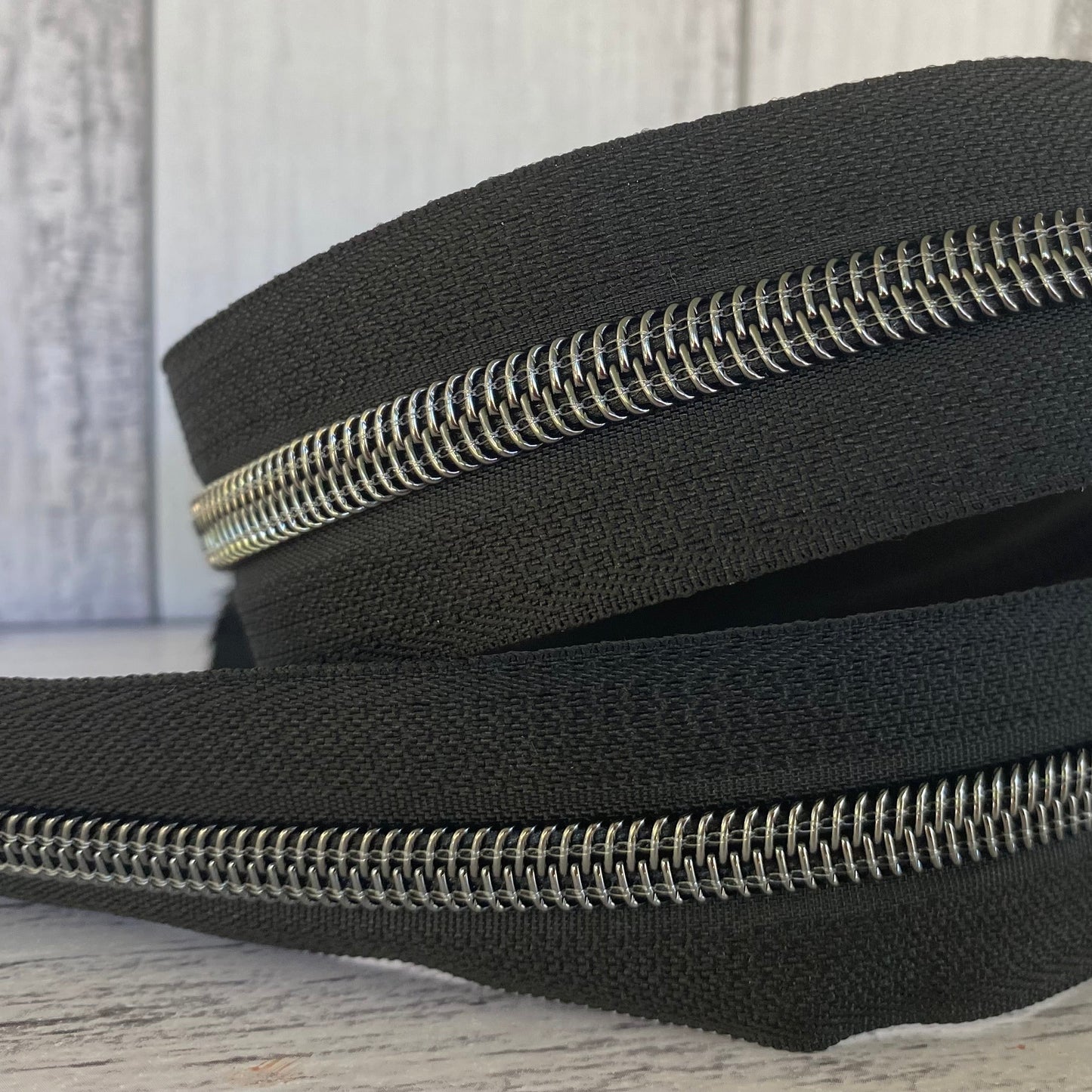 #5 Black zipper gunmetal teeth 1, 5 and 10 metre bundles available.