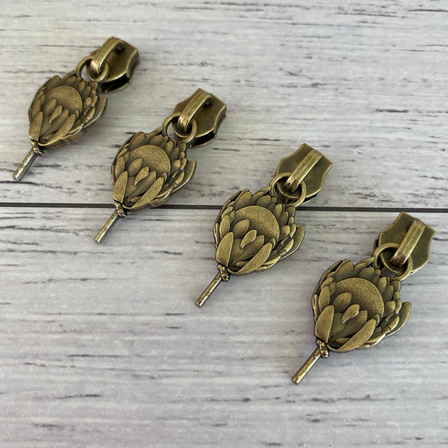 #5 Protea Zipper Pull bronze