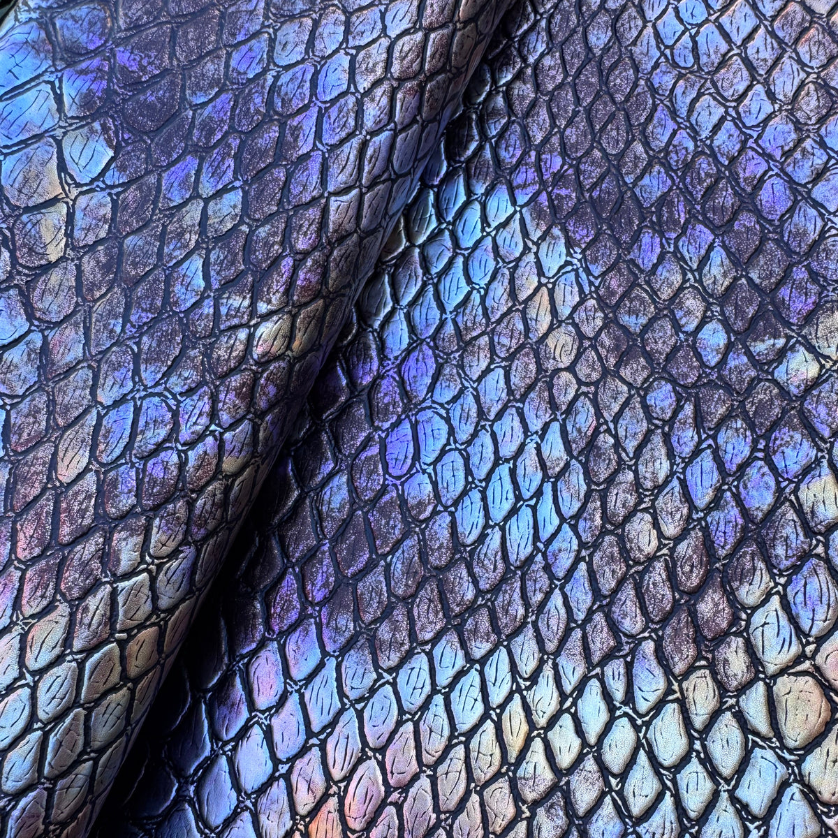 Dragon scale or perhaps Python vinyl/faux leather