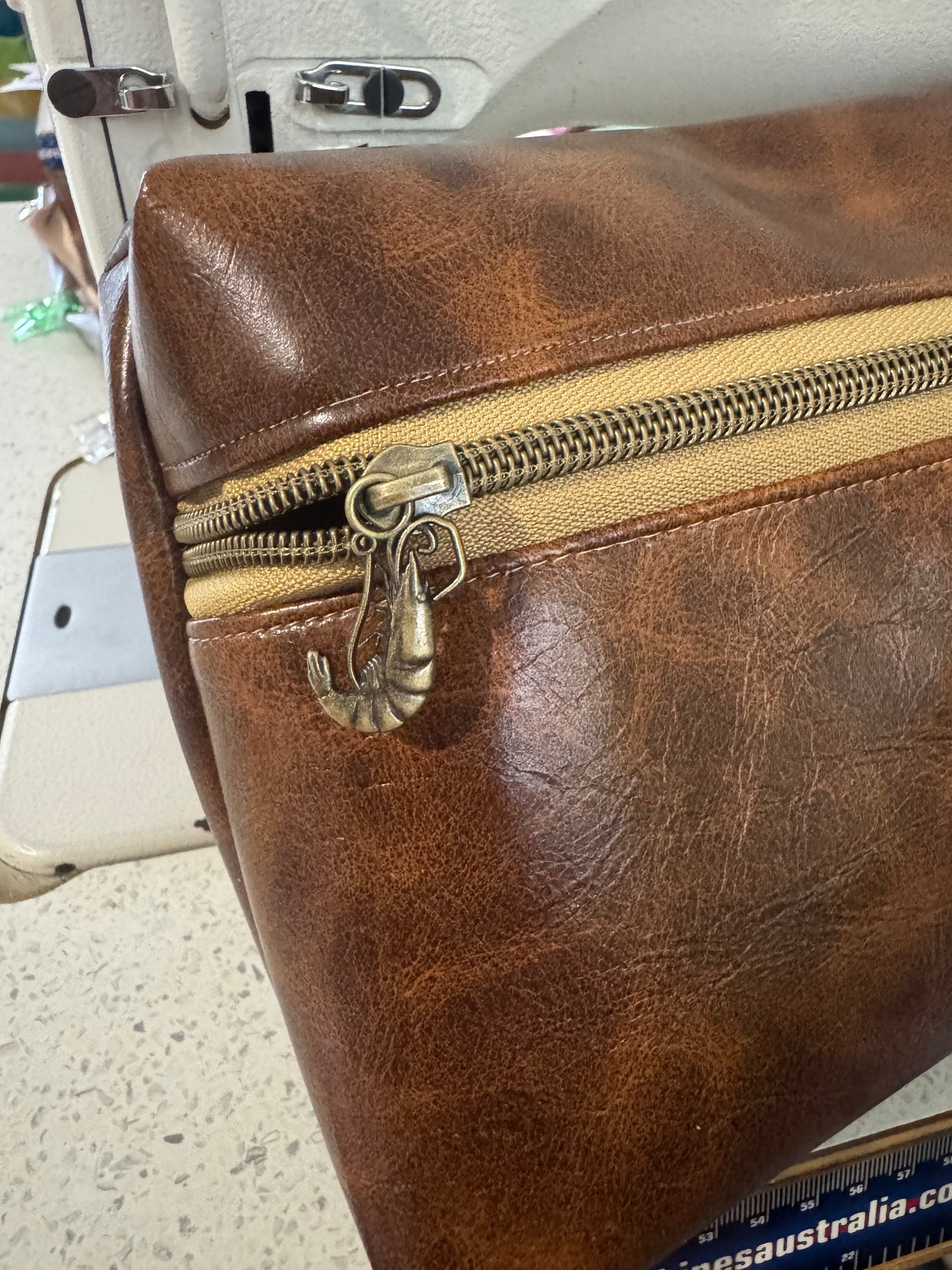 Prawns on a hook for the fishing people bronze